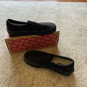 all black slip on vans